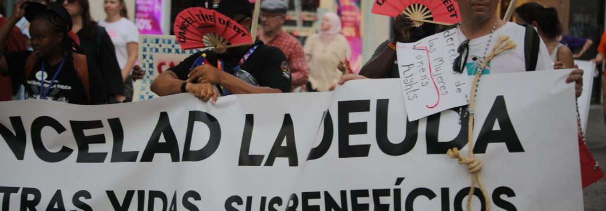 Manifestación exigiendo la cancelación de la deuda